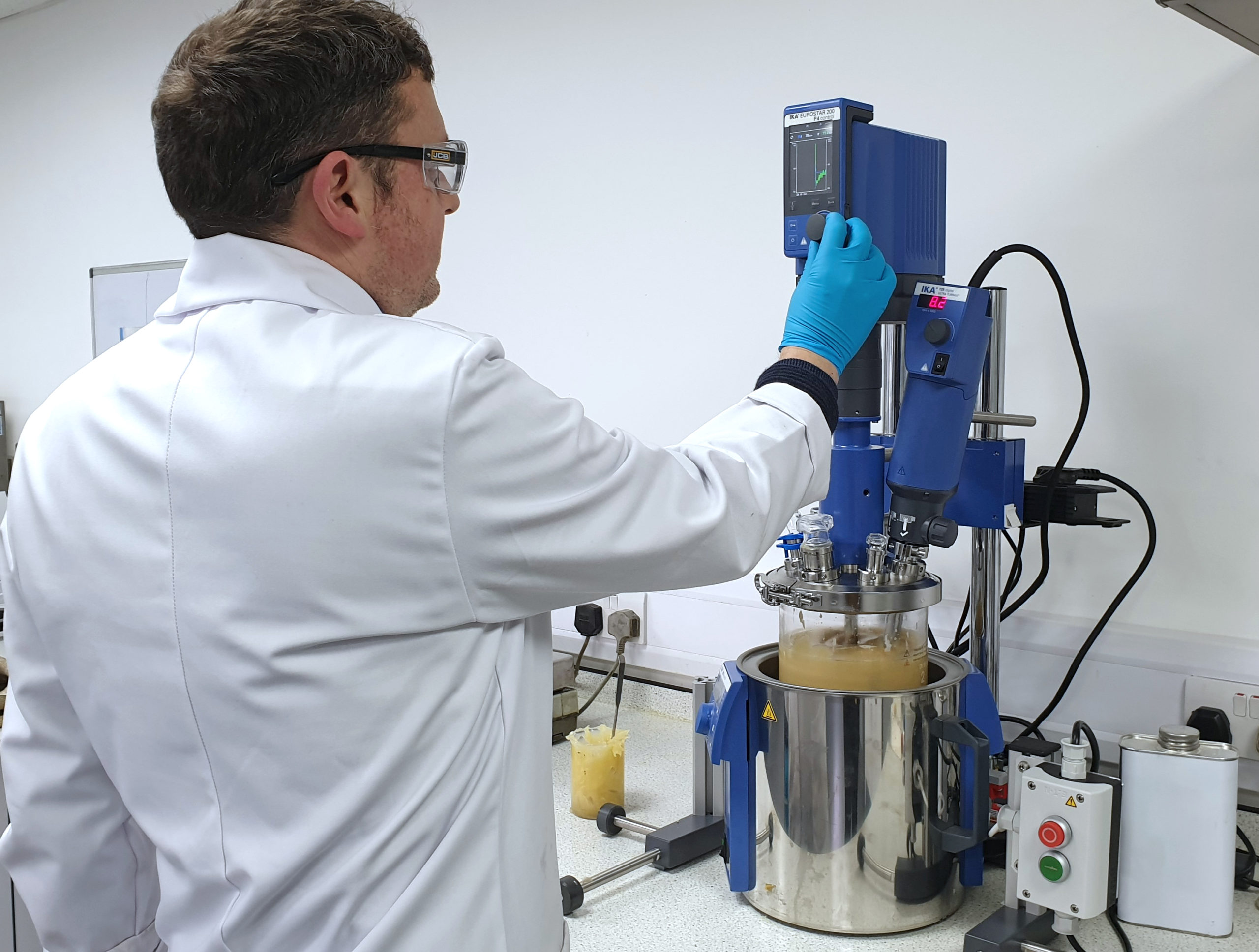 Chemist uses new equipment after Metalube invested heavily into state of the art laboratory